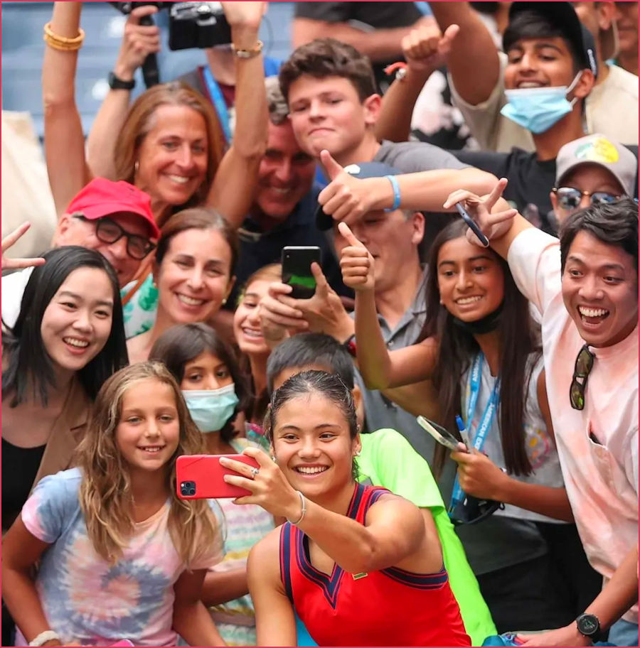 Emma and her adoring fans taking selfies